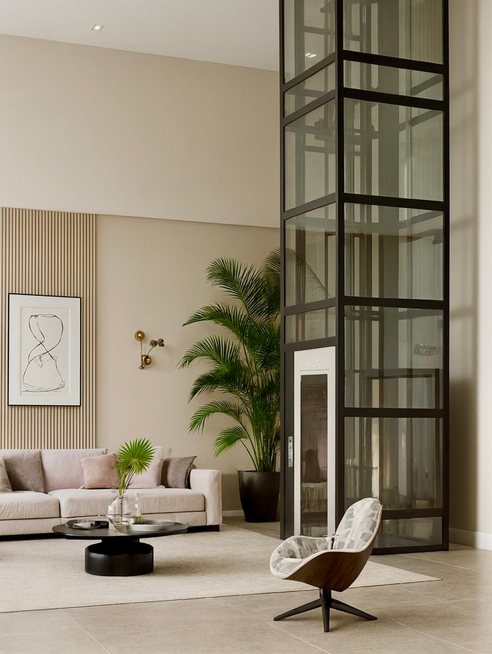 A home lift installed in a modern living room next to a staircase.